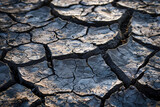 An abstract image of a cracked earth surface, metaphorically showing the widespread and deep impact of economic downturns 