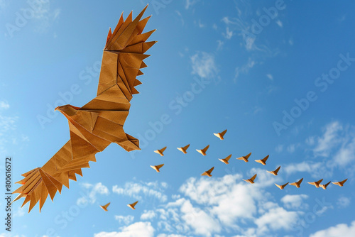 Elegant origami eagle soaring ahead of flock symbolizing visionary leadership clear skies 