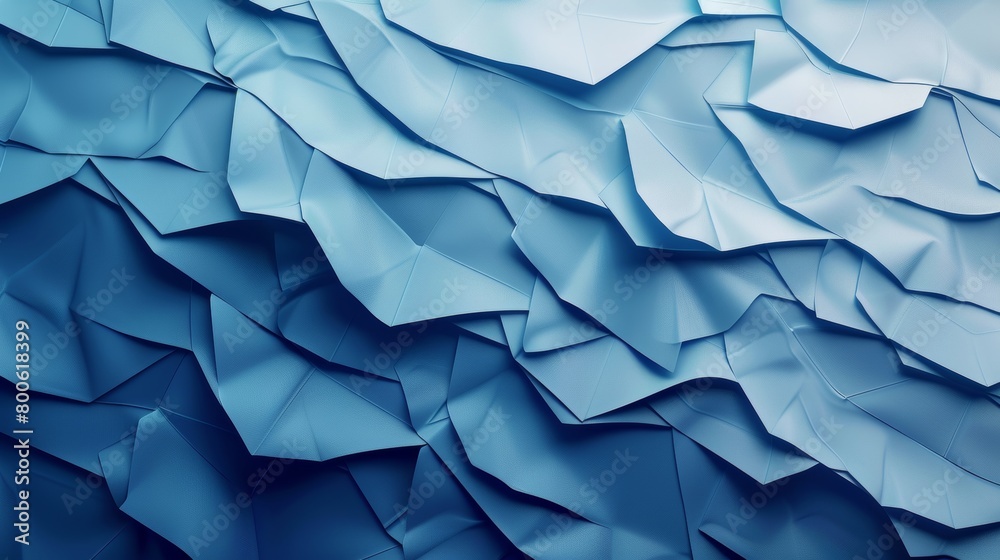 Obraz premium The image is a blue and white paper with a wave pattern. The paper is crumpled and folded, giving it a textured and layered appearance. The blue and white colors create a sense of calmness