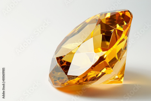 A large yellow diamond is sitting on a white background