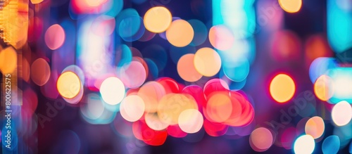 Blur background of beautiful colorful lit city lights