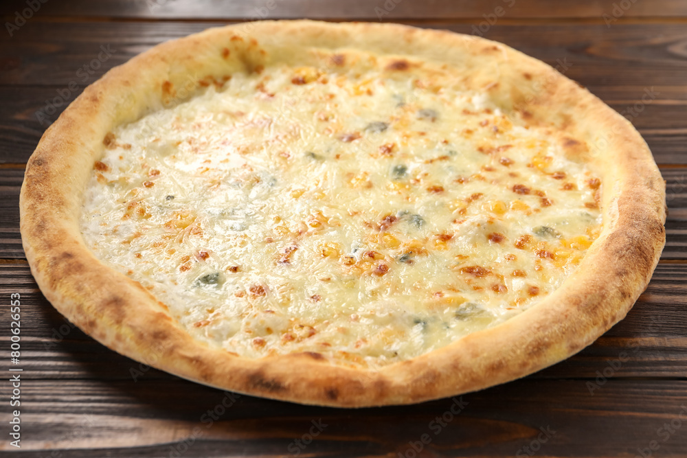 Delicious cheese pizza on wooden table, closeup Delicious cheese pizza on wooden table, closeup