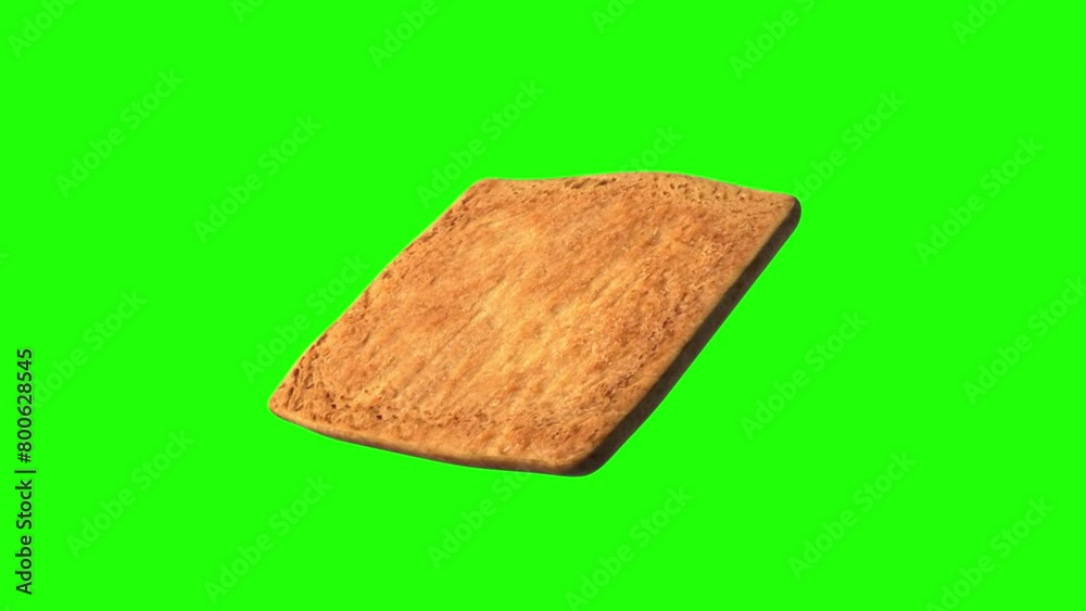 square cracker cookie rotating on a green background. Looping animation. square cracker cookie rotating on a green background. Looping animation.