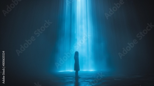 A person standing in front of a blue light coming from the ground, AI