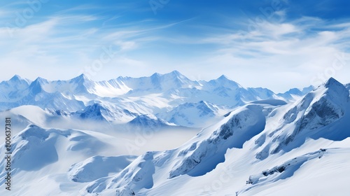 Winter mountains panorama with snow covered peaks and deep blue sky. © I