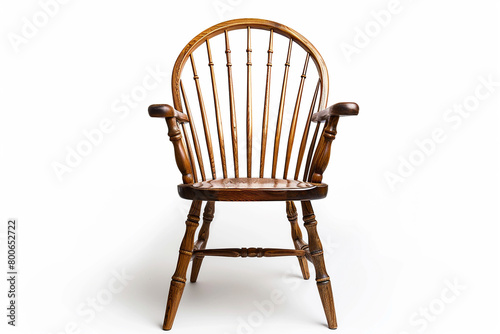 A classic Windsor chair positioned on a white background, isolated on solid white background.