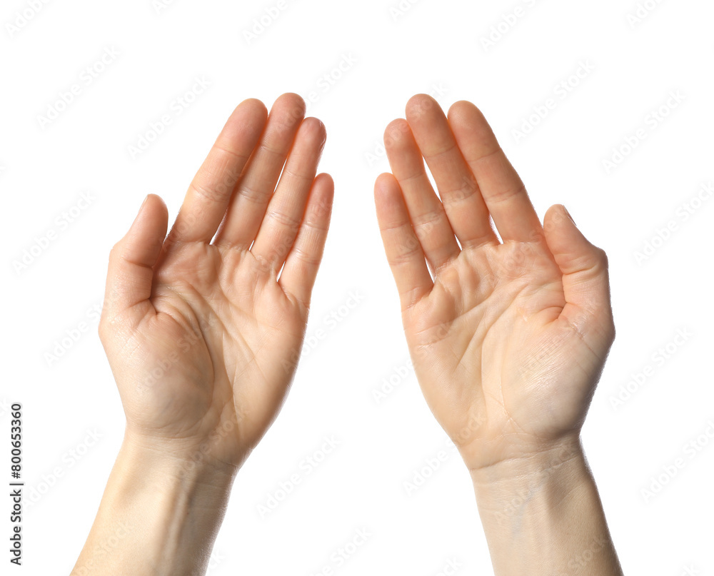 Religion. Woman with open palms praying on white background, closeup Religion. Woman with open palms praying on white background, closeup