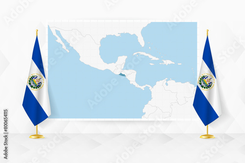 Map of El Salvador and flags of El Salvador on flag stand.