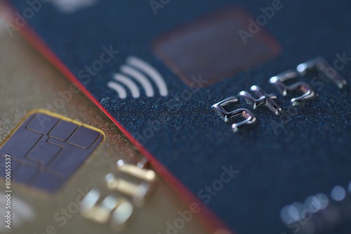 Two plastic credit cards as background, macro view