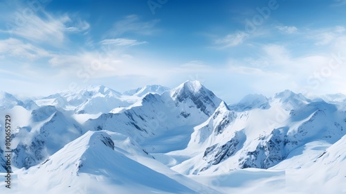Panoramic view of snowy mountains. Snowy winter landscape.