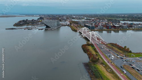 Aerial drone view of modern Enneus Heerma Bridge Amsterdam Netherlands