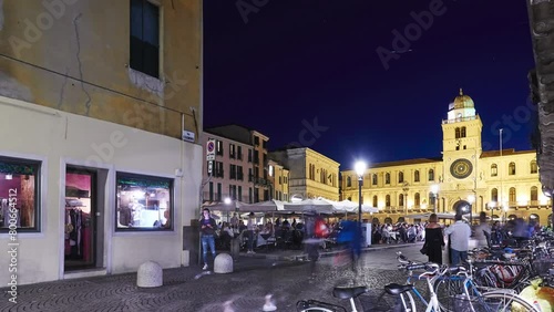 PADUA, ITALY - APRIL 21 2018: Torre dell'Orologio, is astronomical clock tower located in Plaza Dei Signori and positioned between the Palace del Capitanio and Palazzo dei Camerlenghi in Padua, Italy. photo