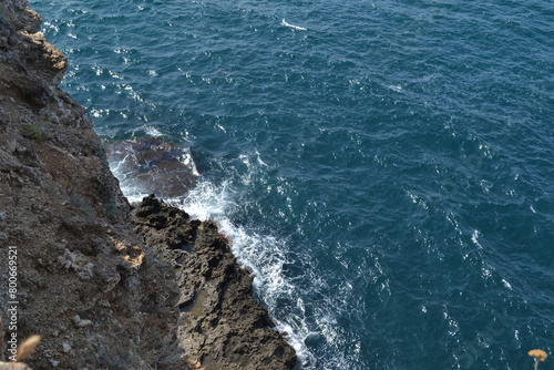 waves crashing on rocks