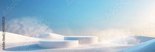 hite podium on a sand dune with a light mist behind it and a bright blue sky