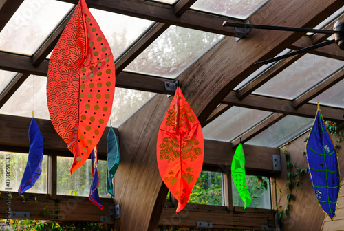 A view of colorful leaf lanterns or mobiles hanging at the entrance to the JC Raulston Arboretum in Raleigh, North Carolina. © Mark Alan Howard