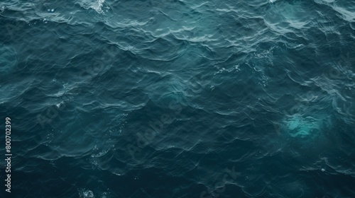 tranquil dark teal sea surface background © StraSyP BG