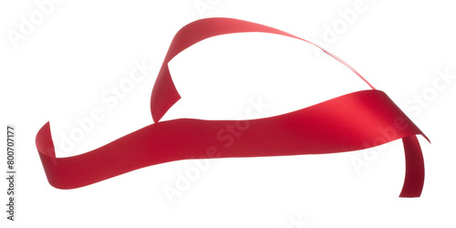 Red ribbon long straight fly in air with curve roll shiny. Red ribbon for present gift birthday party to wrap around decorate and make of textile cloth long straight. White background isolated