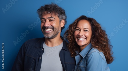 Joyful Mature Couple in Blue Tones. Generative AI.
