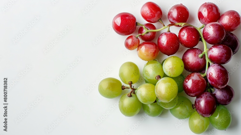 A minimalist composition of red and green grapes on a white background generative ai A minimalist composition of red and green grapes on a white background generative ai
