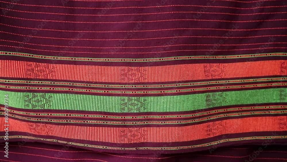 Handmade woven with unique pattern from Indonesia, close up textured fabric background