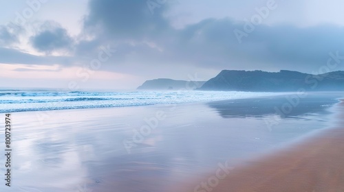 Early morning warm dawn light seascape beach ocean shore  overcast  empty  wide banner