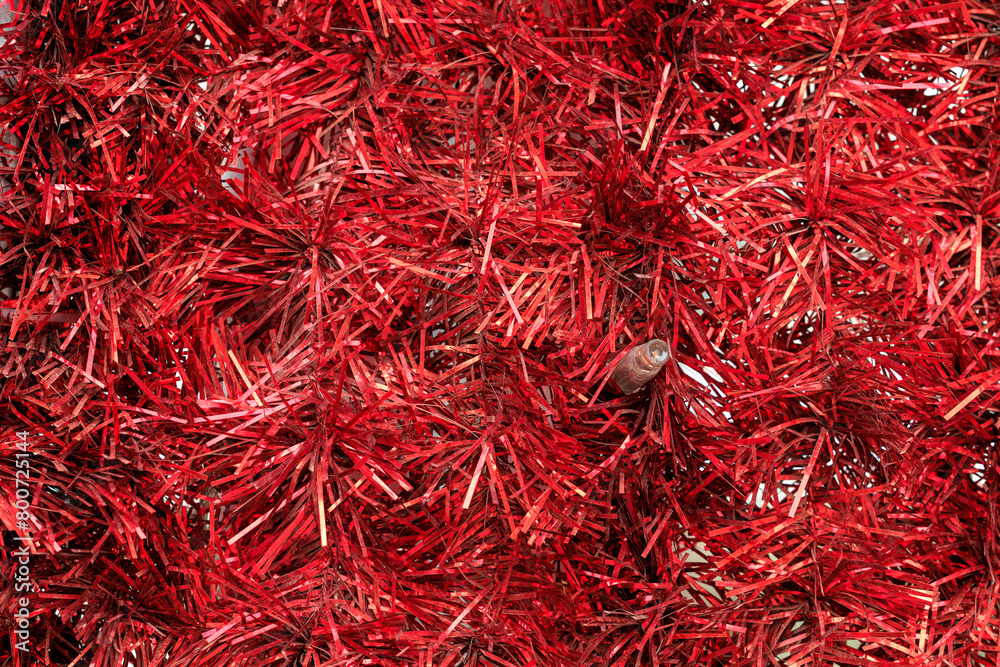 Red Christmas tree with red tinsel Red Christmas tree with red tinsel