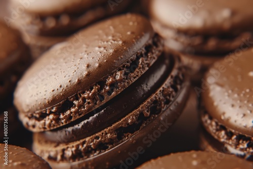 Many brown cookies in chocolate and coffee flavours, isolated. delicious macaroon dessert.