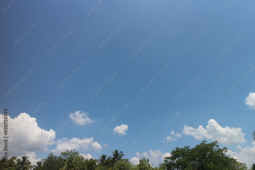Blue sky with white clouds. Blue background. The summer sky is colorful clearing day and beautiful nature in the morning. for backdrop decorative and wallpaper design. Blue sky with white clouds. Blue background. The summer sky is colorful clearing day and beautiful nature in the morning. for backdrop decorative and wallpaper design.