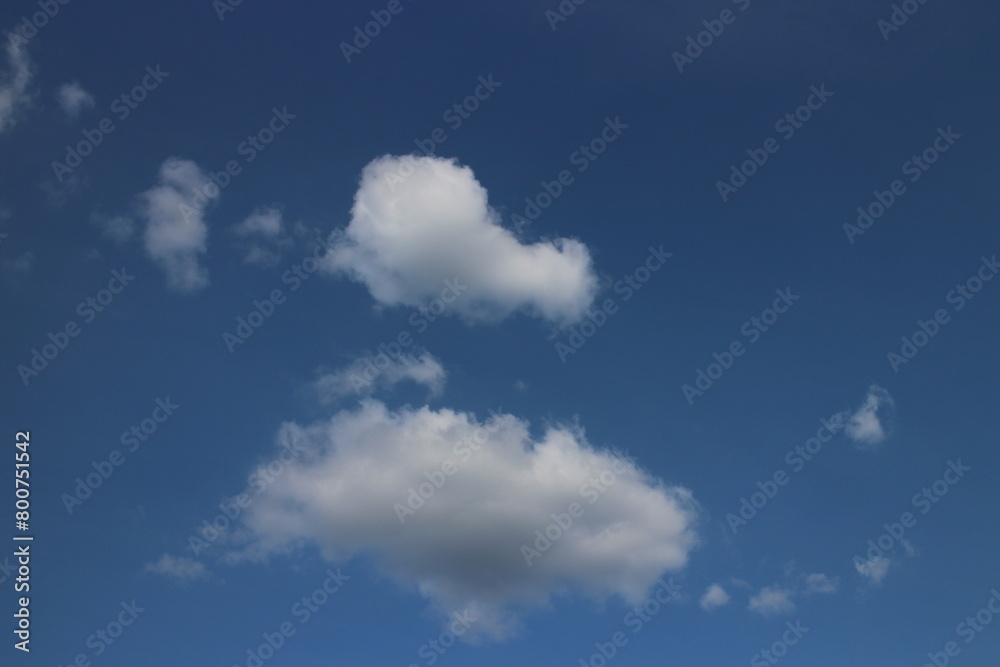 Blue sky with white clouds. Blue background. The summer sky is colorful clearing day and beautiful nature in the morning. for backdrop decorative and wallpaper design. The perfect sky background. Blue sky with white clouds. Blue background. The summer sky is colorful clearing day and beautiful nature in the morning. for backdrop decorative and wallpaper design. The perfect sky background.