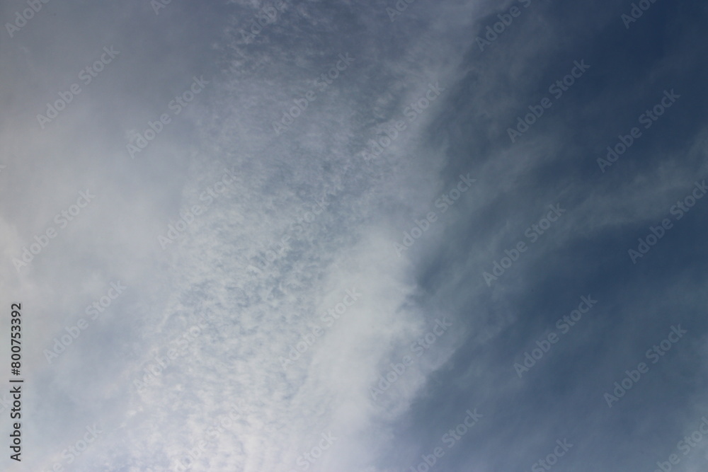 Fototapeta premium blue sky background with tiny clouds