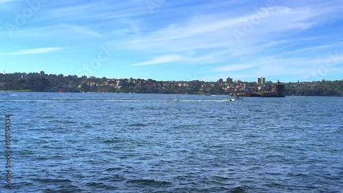 Sydney Harbour forshore viewed from the Gardens in NSW Australia on a nice sunny and partly cloudy afternoon blue skies photo