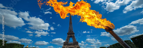 background of the eiffel tower and the olympic torch