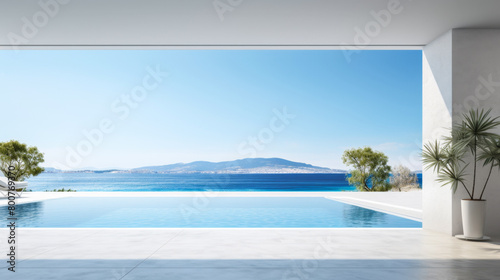 A large pool with a view of the ocean. The pool is surrounded by trees and a palm tree. The water is calm and clear. The sky is blue and there are no clouds. The scene is peaceful and relaxing