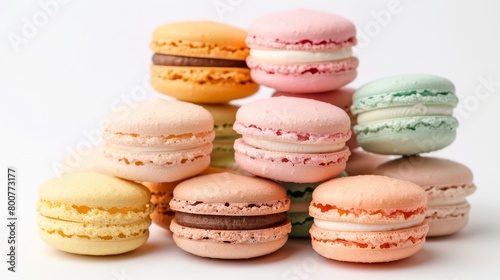 Assorted colorful macarons in soft pastel shades, arranged in a delicate pyramid, seamless white background, studio lighting