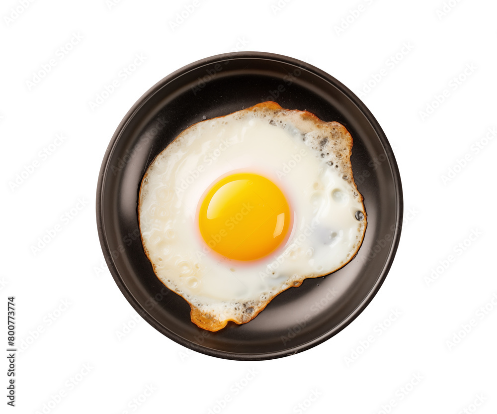 A single sunny-side-up egg in a non-stick frying pan, with crisp edges and a bright yolk, isolated on transparent background. Generative AI A single sunny-side-up egg in a non-stick frying pan, with crisp edges and a bright yolk, isolated on transparent background. Generative AI