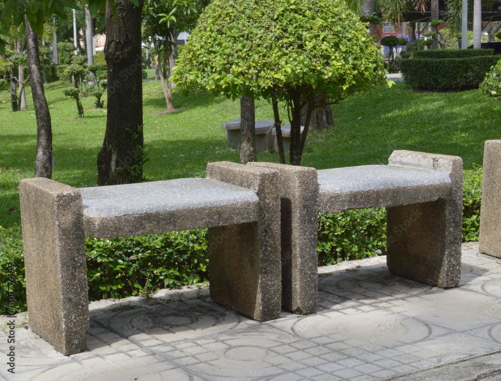 Fototapeta premium bench and stone in city park