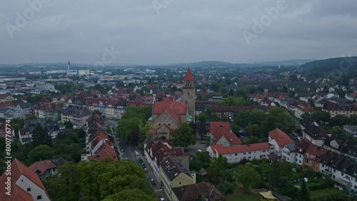 Wallpaper Mural Aerial drone view of The Church of St. Joseph, a Roman Catholic parish church located in the Schölerberg district of Osnabrück, Germany.  Torontodigital.ca