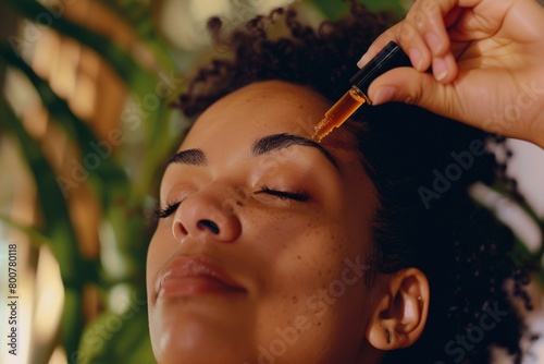 essential oil roll-on applied to a persons temples, promoting relief from stress and headaches