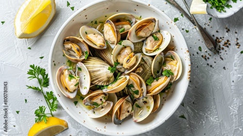 Fresh clams and herbs steamed to perfection, shot from above, bright and airy feel with a subtle shadow play, soft studio lighting