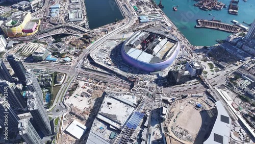 Hong Kong Kai Tak Sports Park includes a world-class multi-purpose main venue with retractable canopy and coastal dining area by seaside Victoria Harbour connected Station Metropolitan Park photo