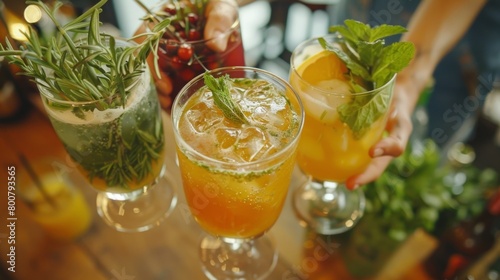 The host greets guests with a warm smile offering a selection of nonalcoholic cocktails made with fresh juices and herbs.