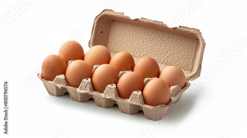 An open egg box containing ten brown eggs is isolated on a white background, emphasizing fresh organic chicken eggs stored in a carton pack with ample copy space provided.