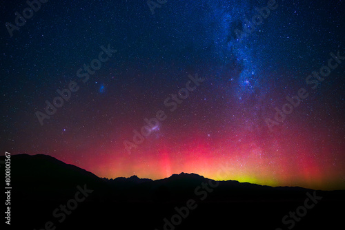 Rare aurora australis southern light with milky way long exposure photo near Fox Glacier, New Zealand