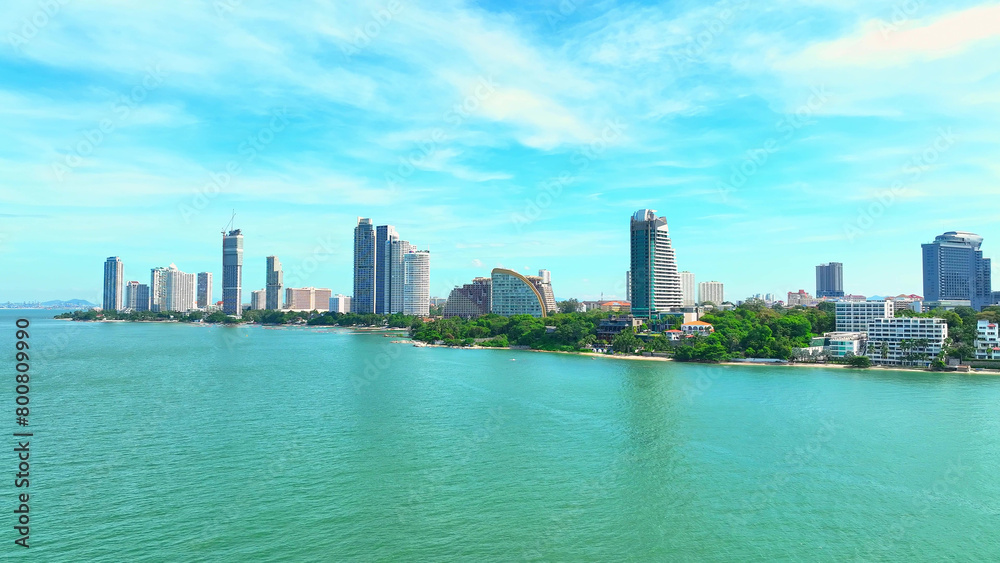 An exotic paradise unfolds below, where palm-fringed beaches meet a bustling city, all captured by a drone. A captivating blend of nature and modernity. Pattaya Beach, Thailand. Travel concept.
An exotic paradise unfolds below, where palm-fringed beaches meet a bustling city, all captured by a drone. A captivating blend of nature and modernity. Pattaya Beach, Thailand. Travel concept.