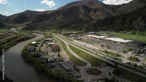 Static aerial above town of Glenwood Springs Colorado in springtime above Colorado River
