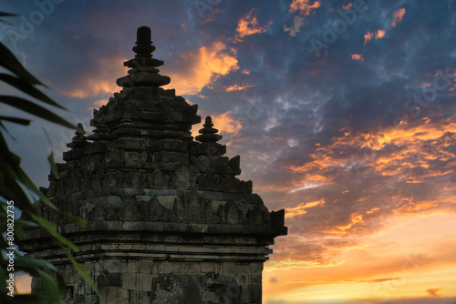 Dramatic evening sky covering old temple of Plaosan in Yogyakarta, Indonesia