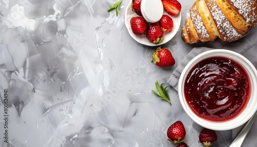 Bird s eye view of a nutritious breakfast topped with strawberry jam