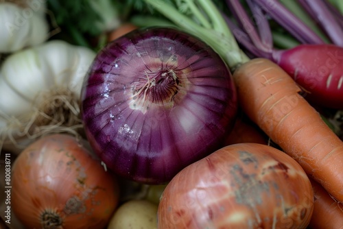 Close up shot of seasonal red onion and various vegetables for soup preparation photo