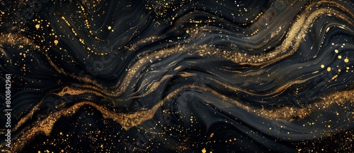 Black and gold abstract background with a liquid marble texture