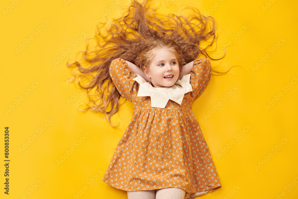 Fototapeta premium mischievous little girl